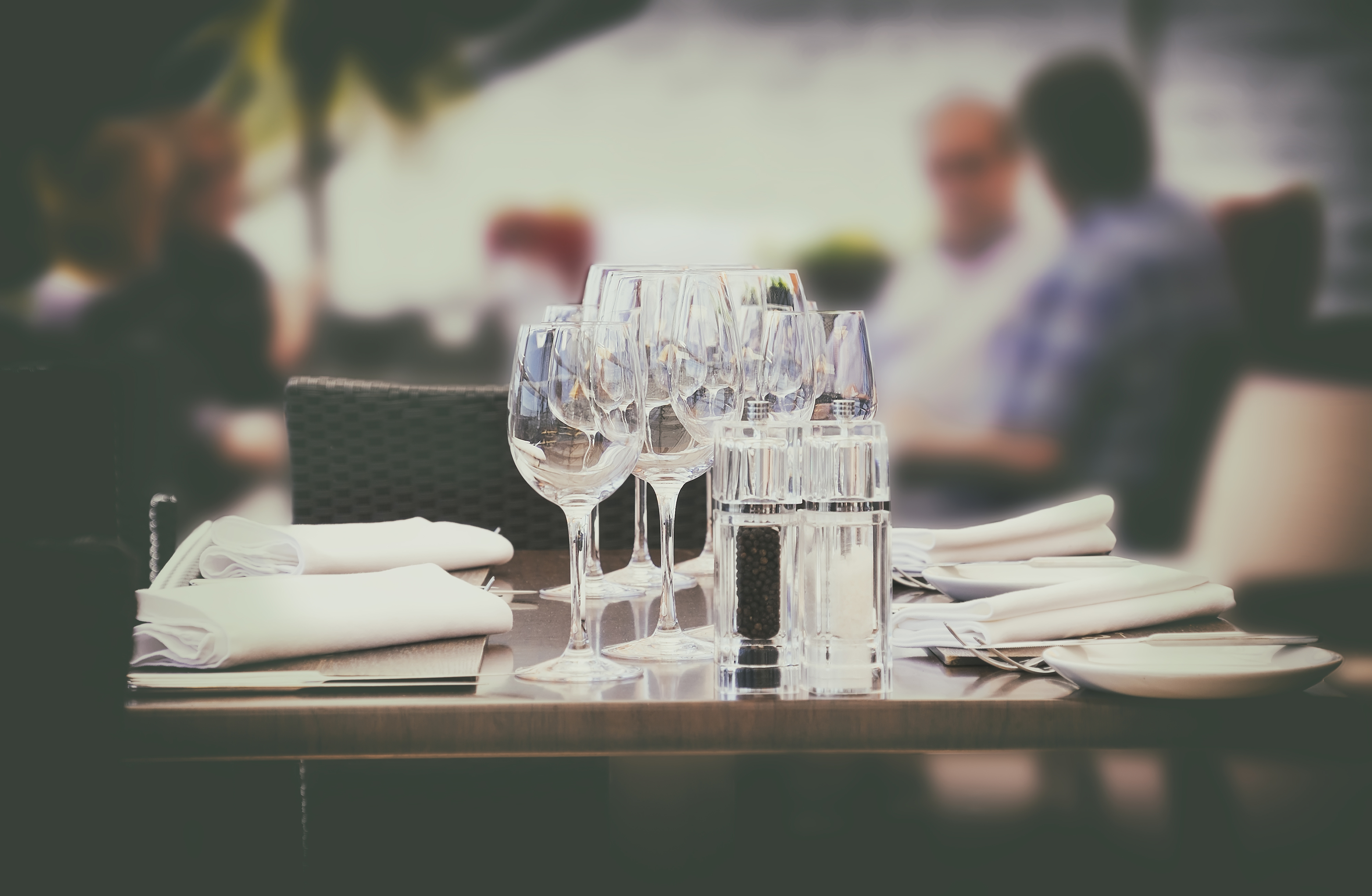 wine glass, people in summer restaurant