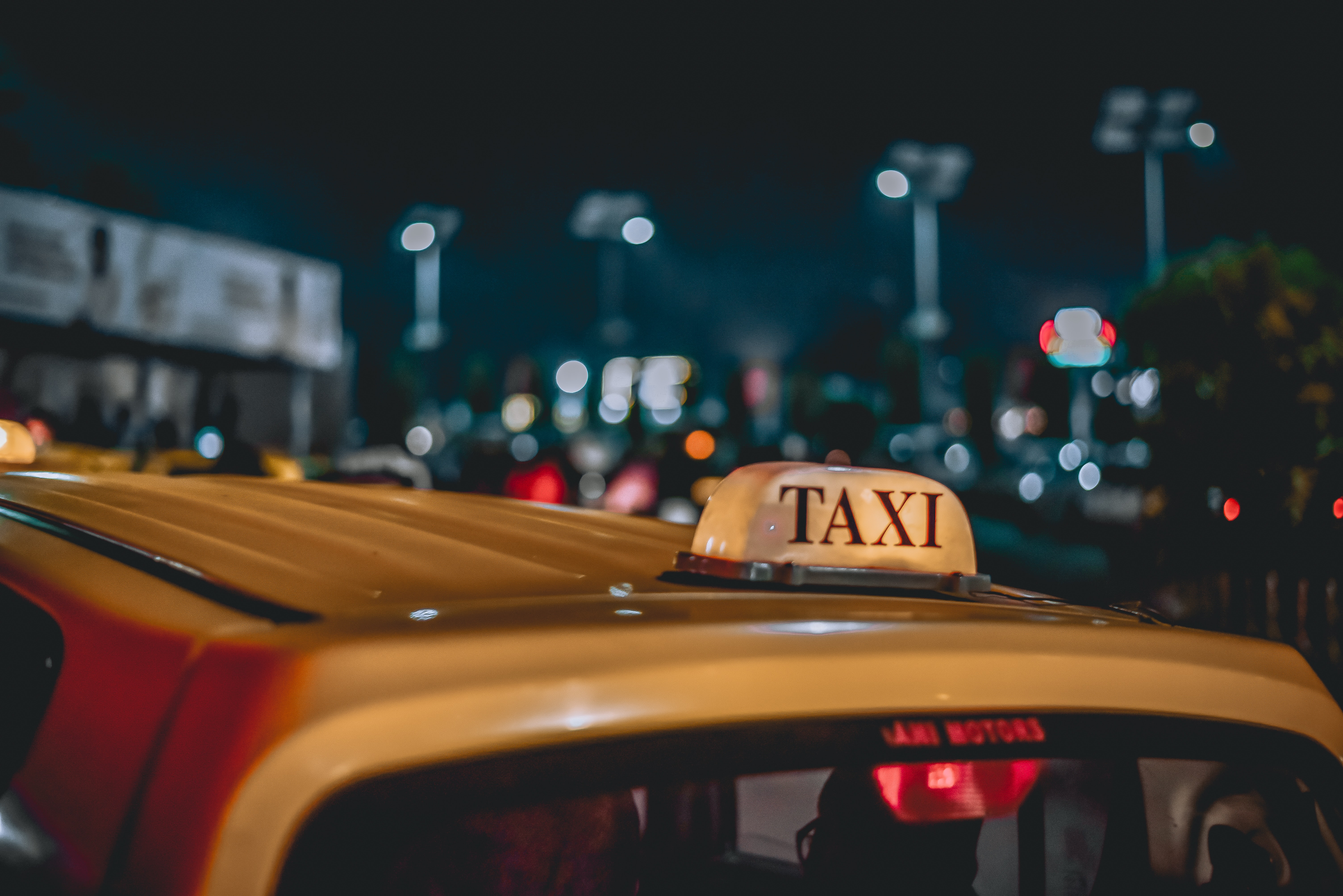 Yellow taxi sign