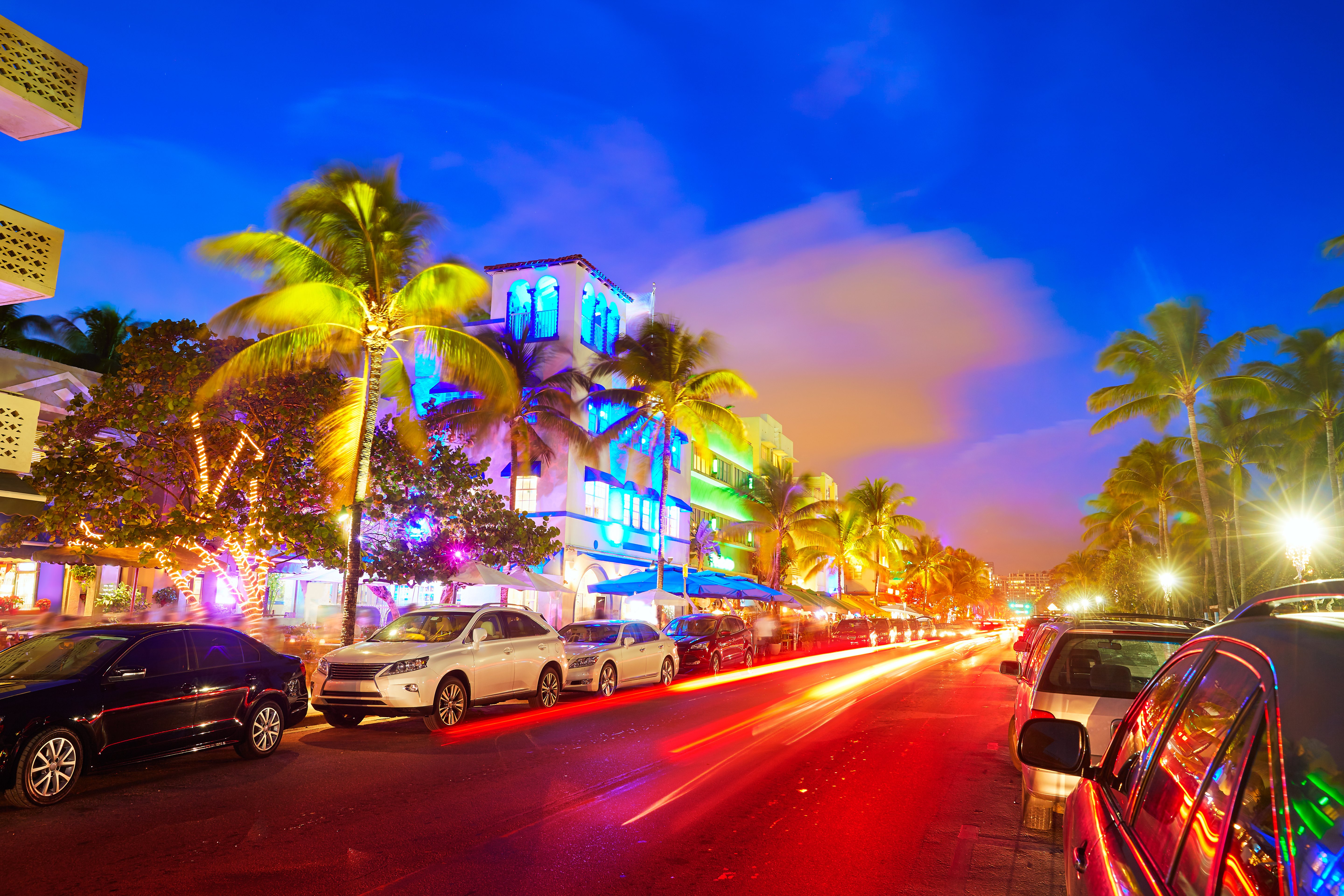 Miami Beach South Beach sunset in Ocean Drive Florida Art Deco and car lights