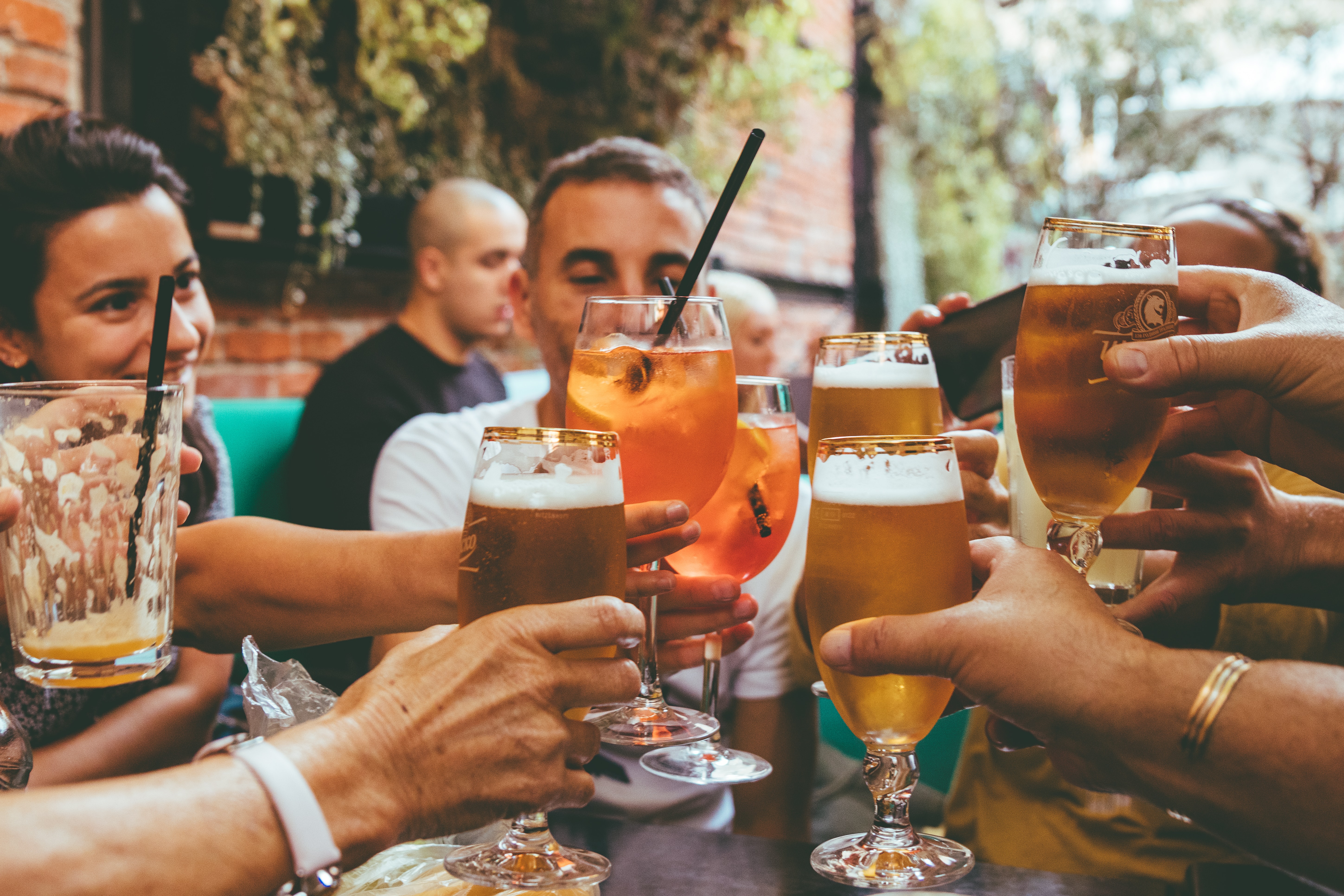 Friends having drinks in a bar in Trastevere, Rome