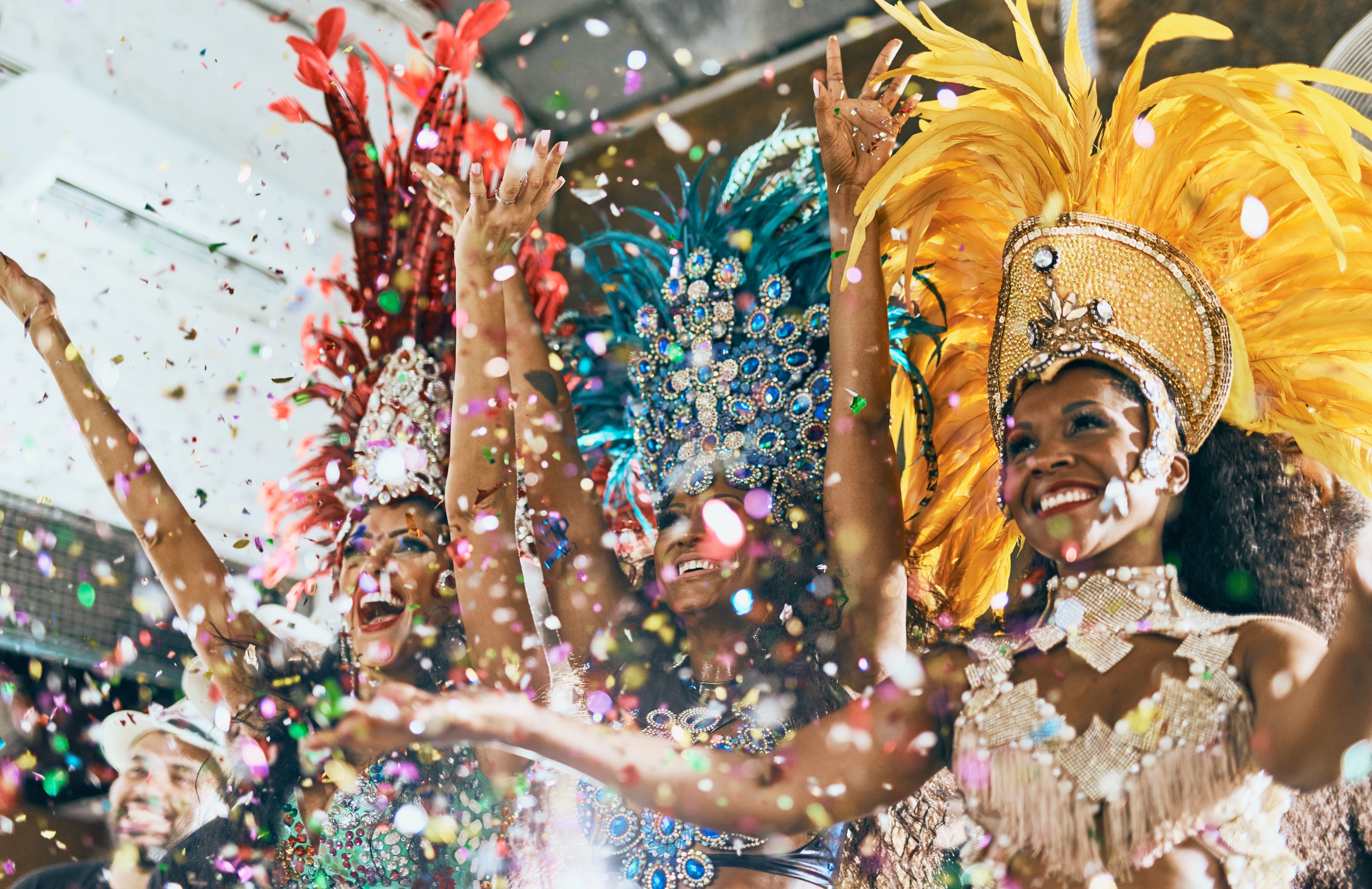 Cropped shot of beautiful samba dancers performing in a carnival