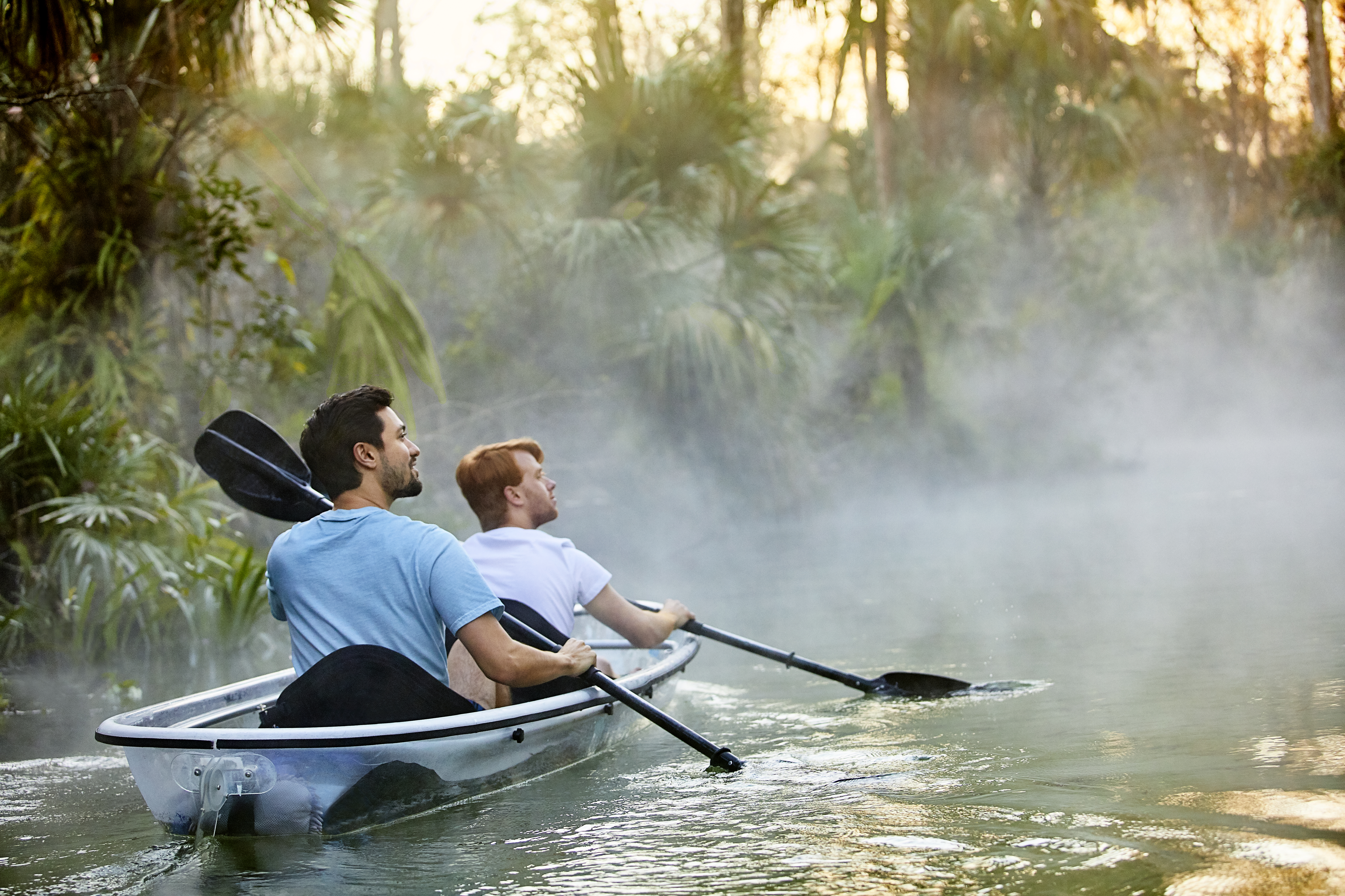 Man and child kayaking