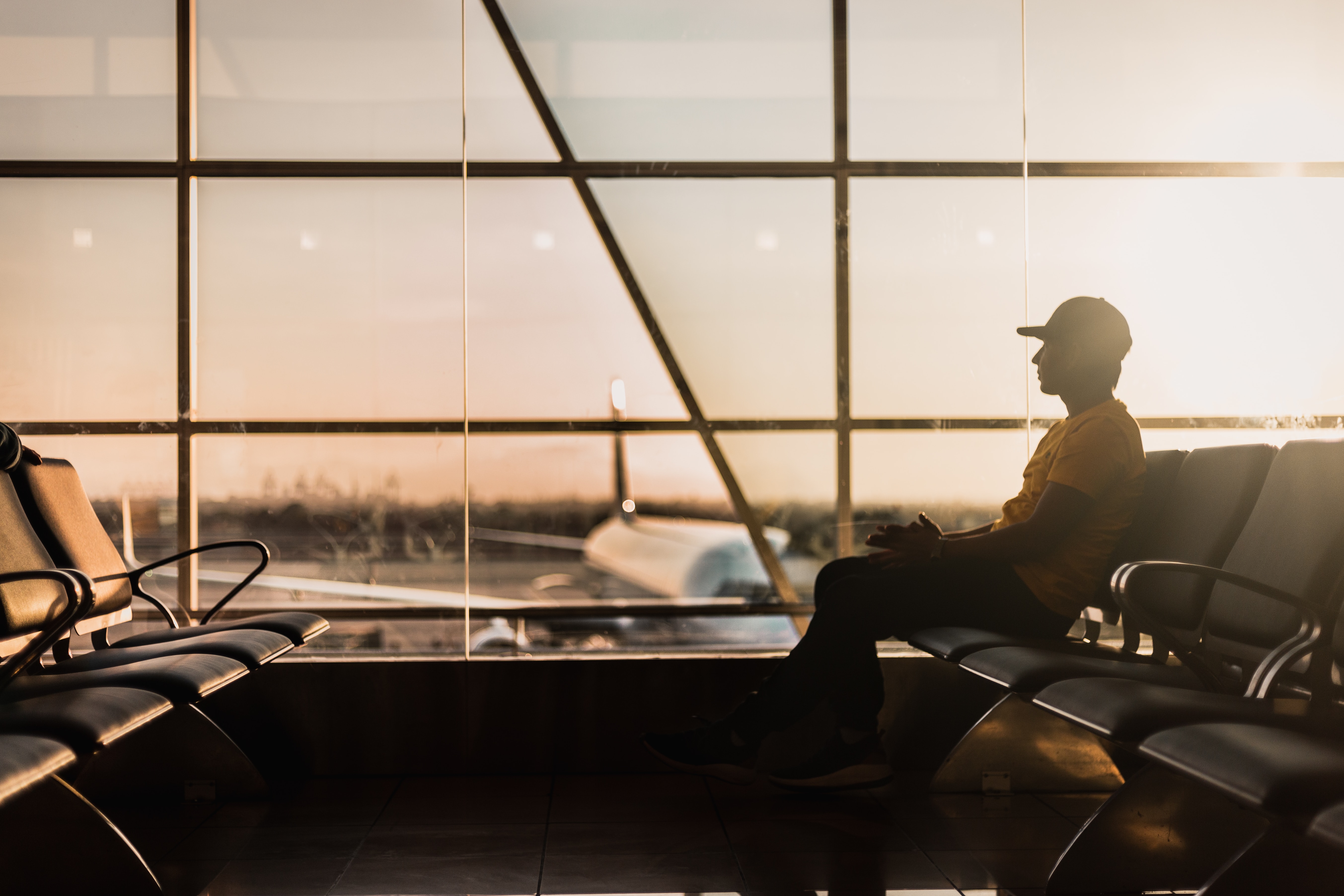 male passanger at an aiport lobby